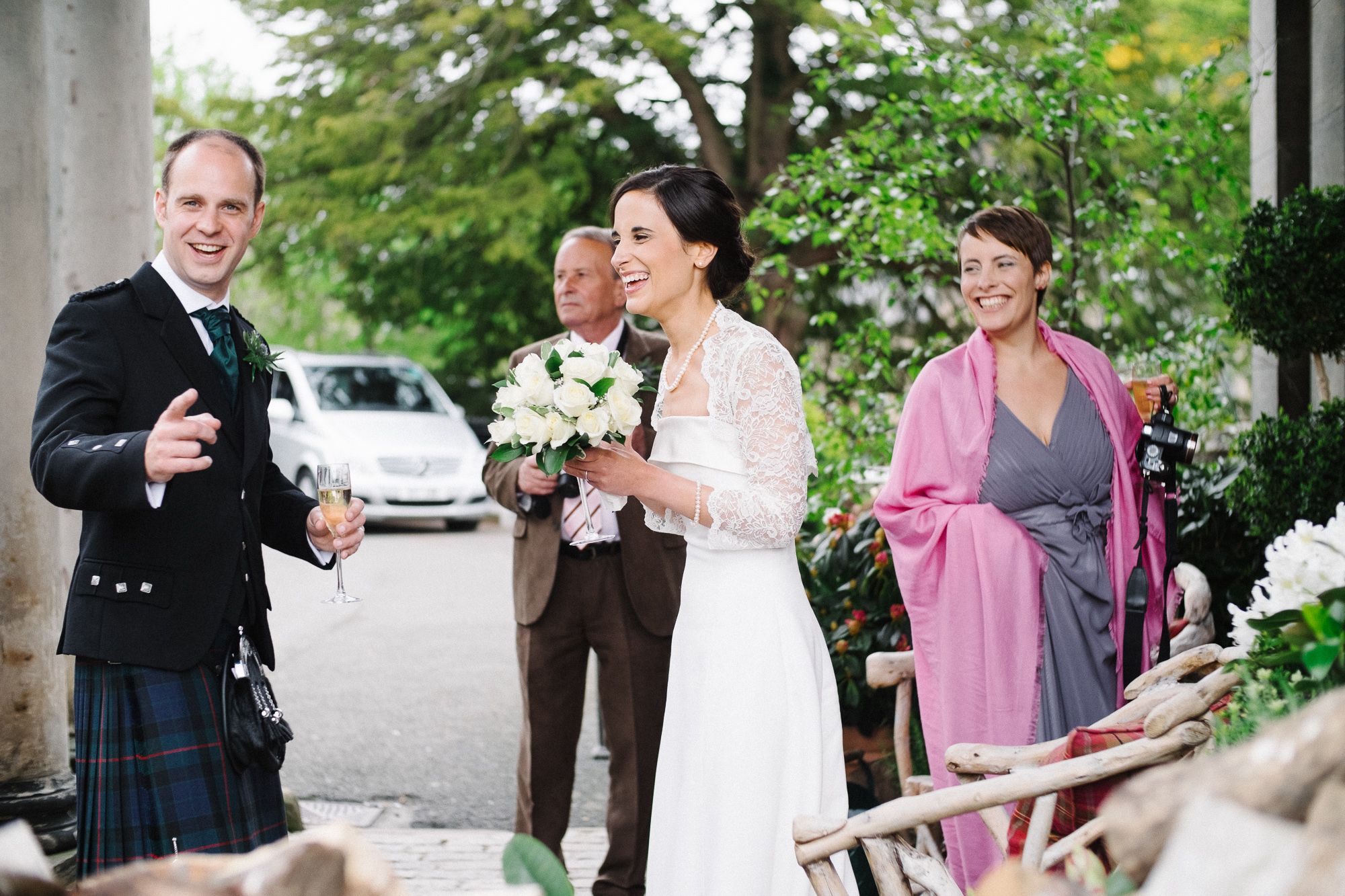 Bride and groom at the entrance of Prestonfield House