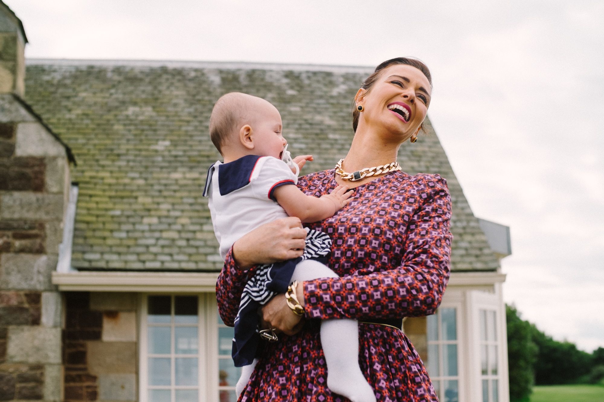 Mother and child on the grounds of Archerfield House Estate before wedding ceremony