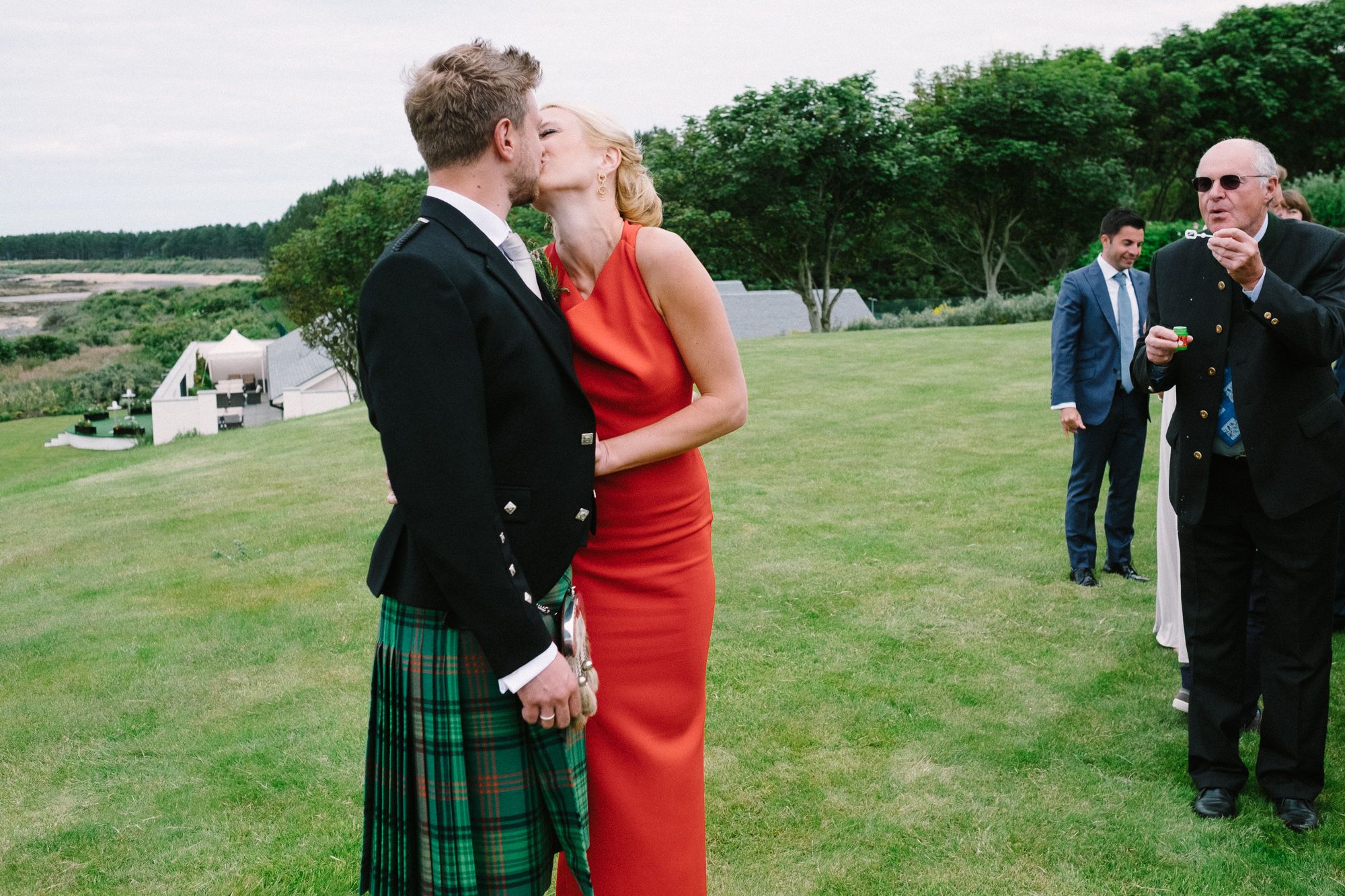 Intimate moment between bride and groom after wedding ceremony