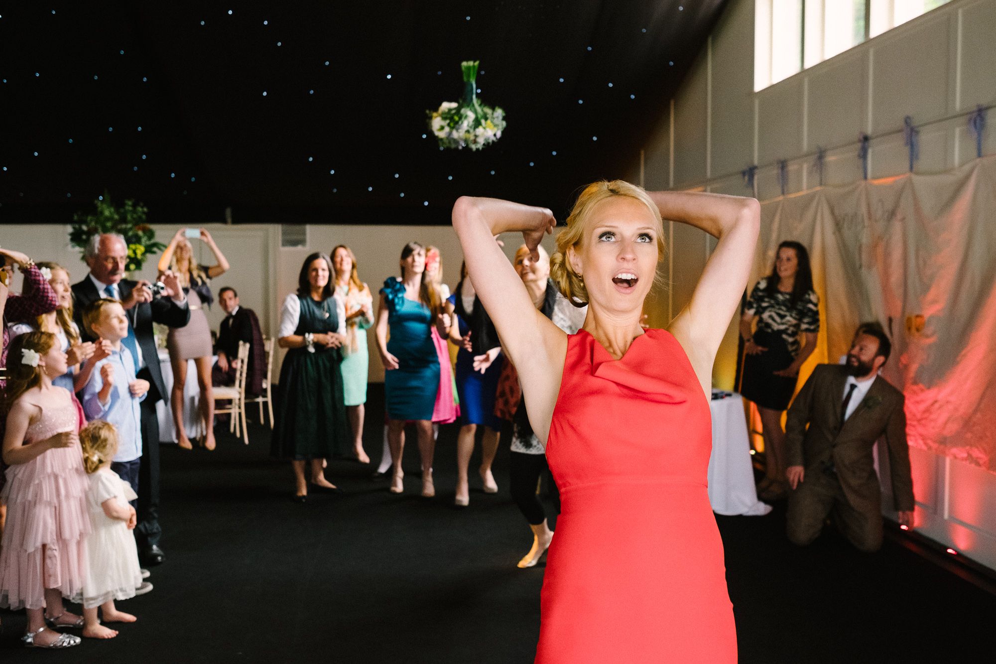 Bride throwing bouquet