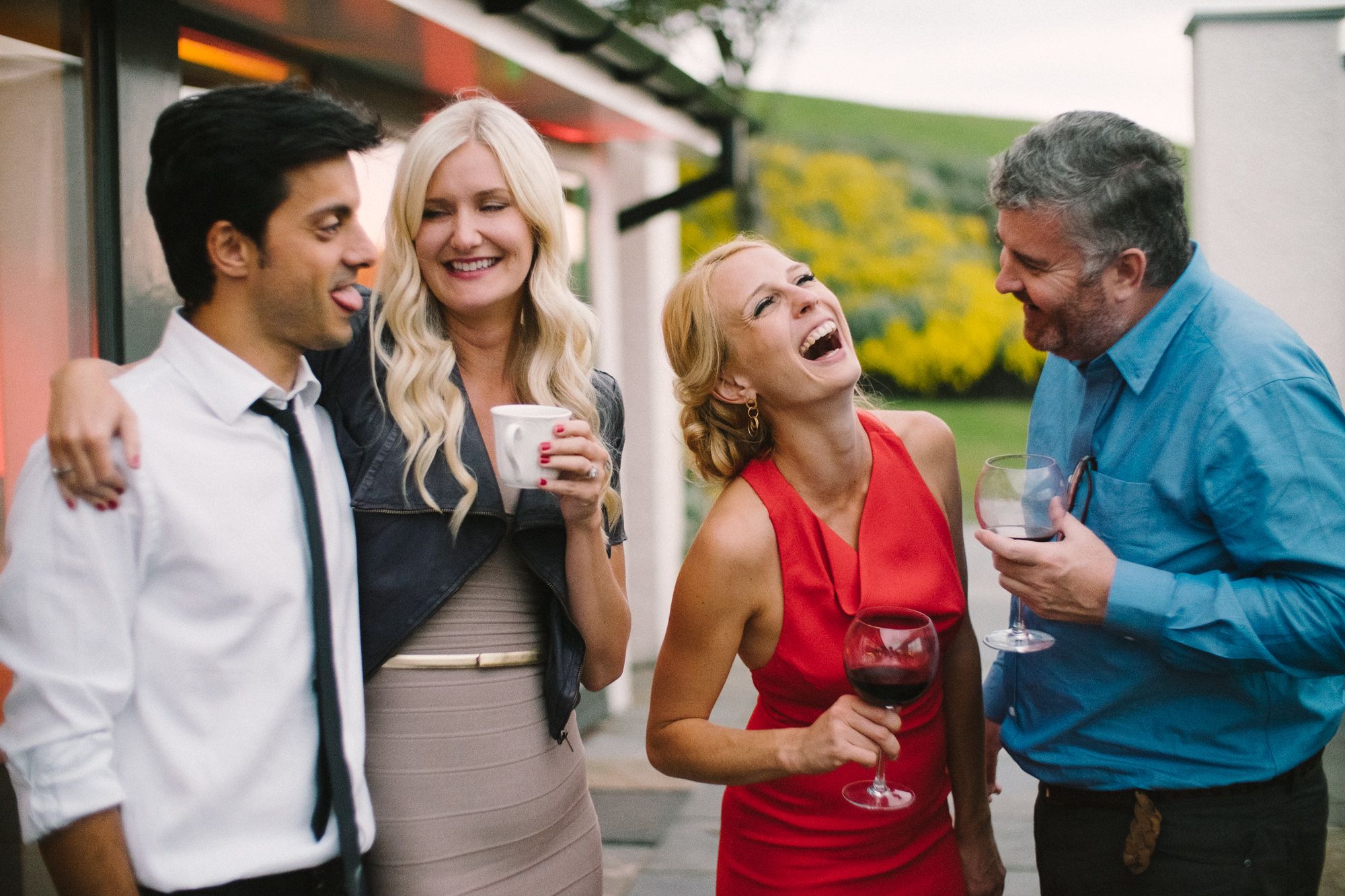 Wedding guests laughing