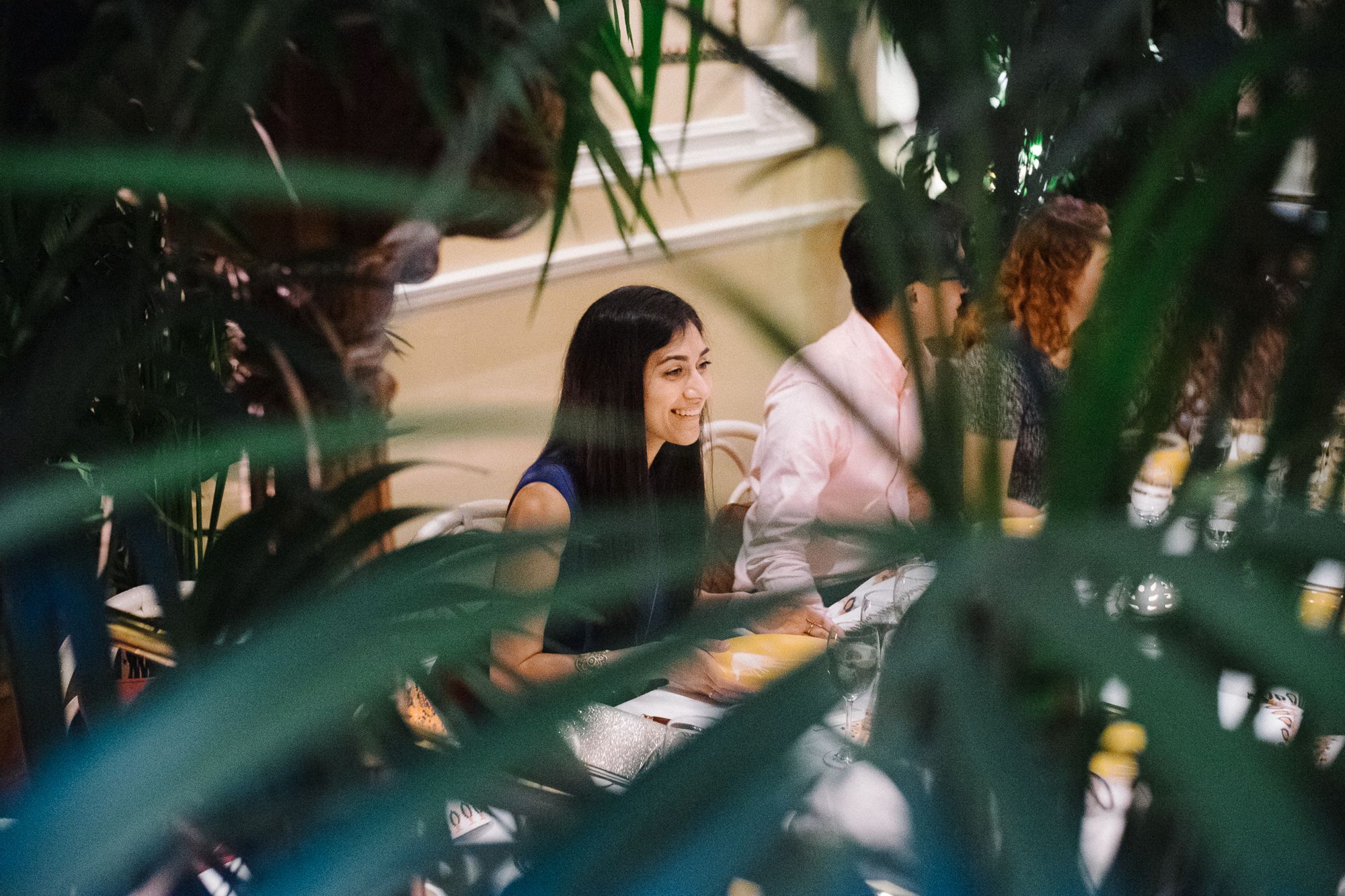 Wedding guest enjoying dinner party at La Porte des Indes restaurant