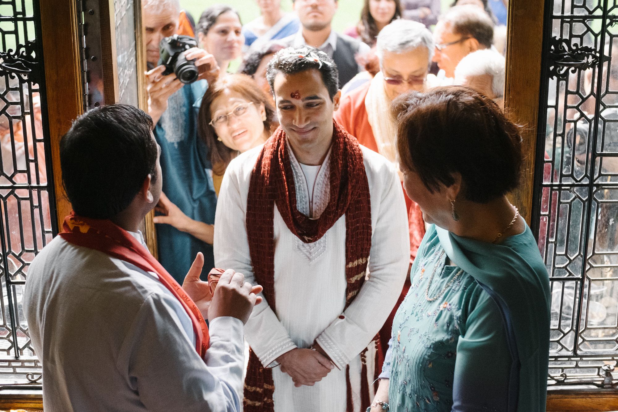 Groom arriving at Bhaktivedanta Manor temple London for Hindu wedding ceremony