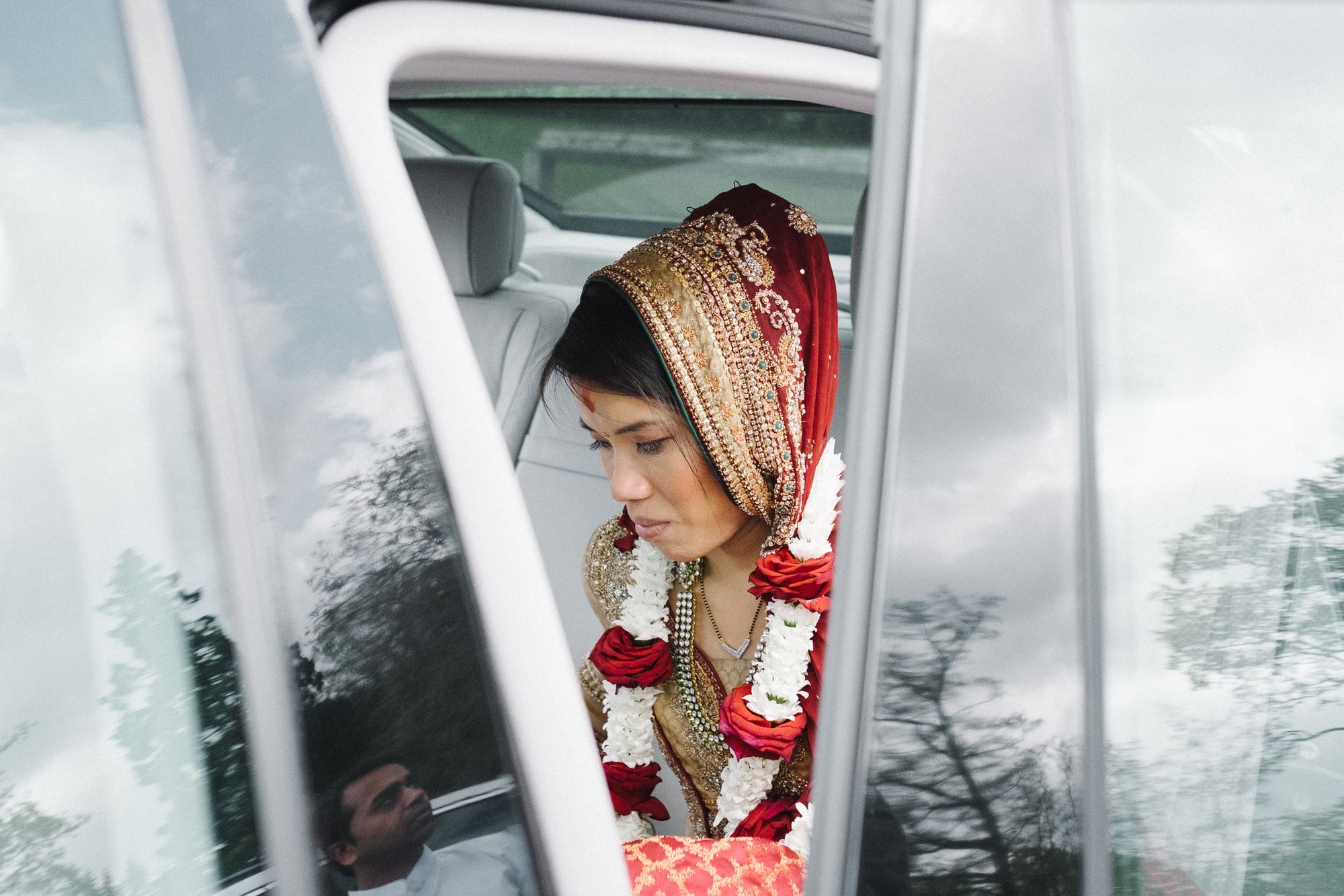 Bride in car at Hindu wedding ceremony London