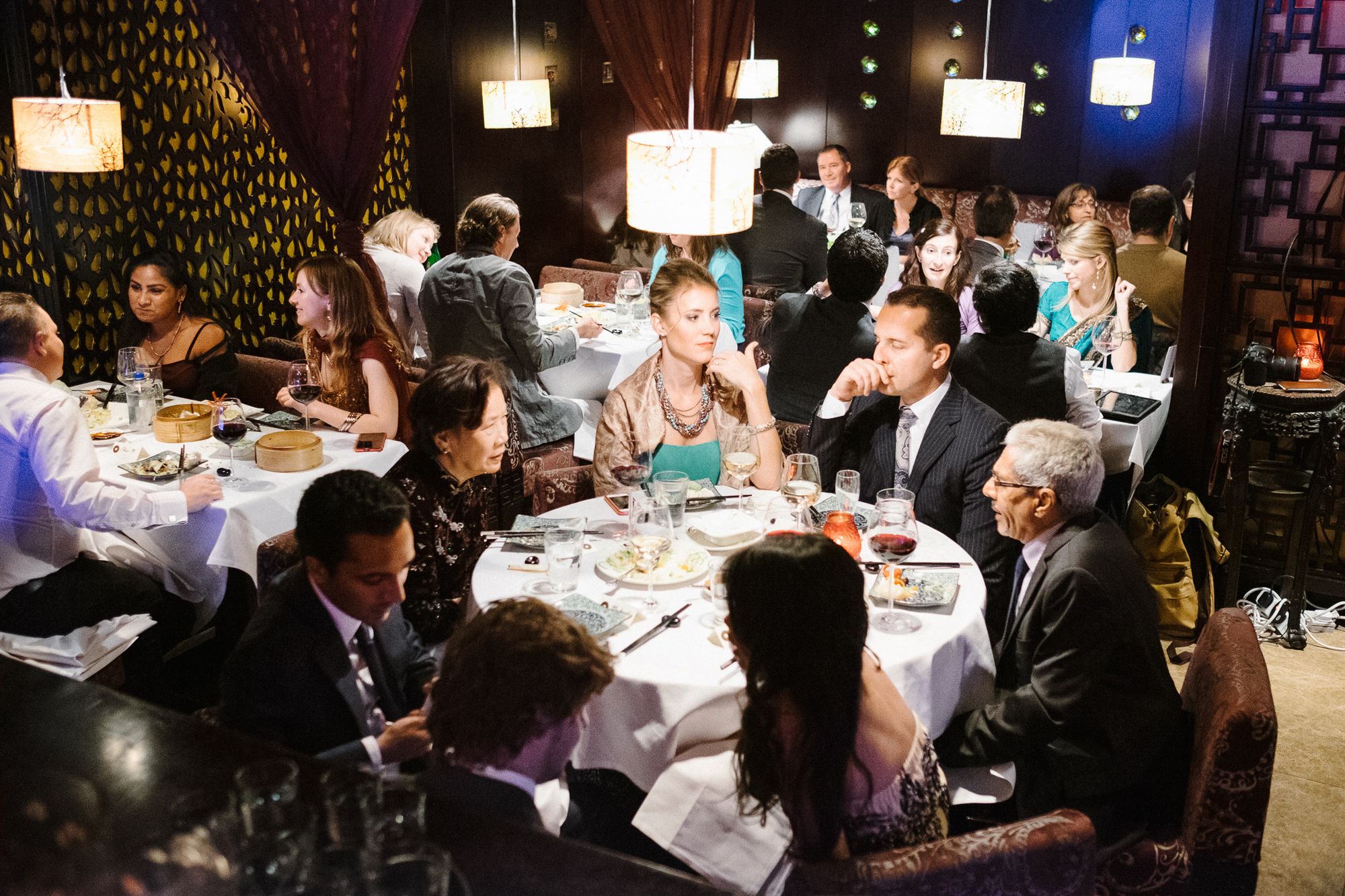 Guests around tables enjoying dinner at Chinese restaurant London