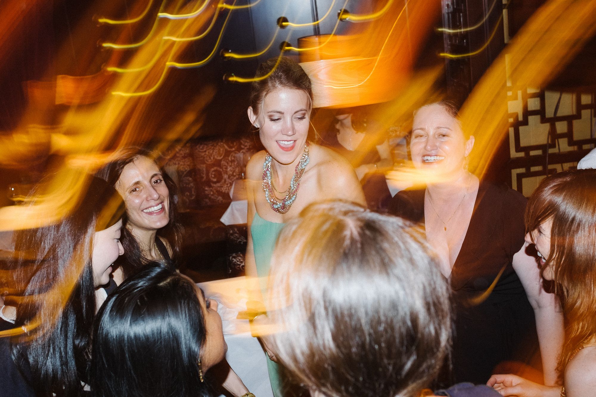 Wedding guests dancing after dinner party