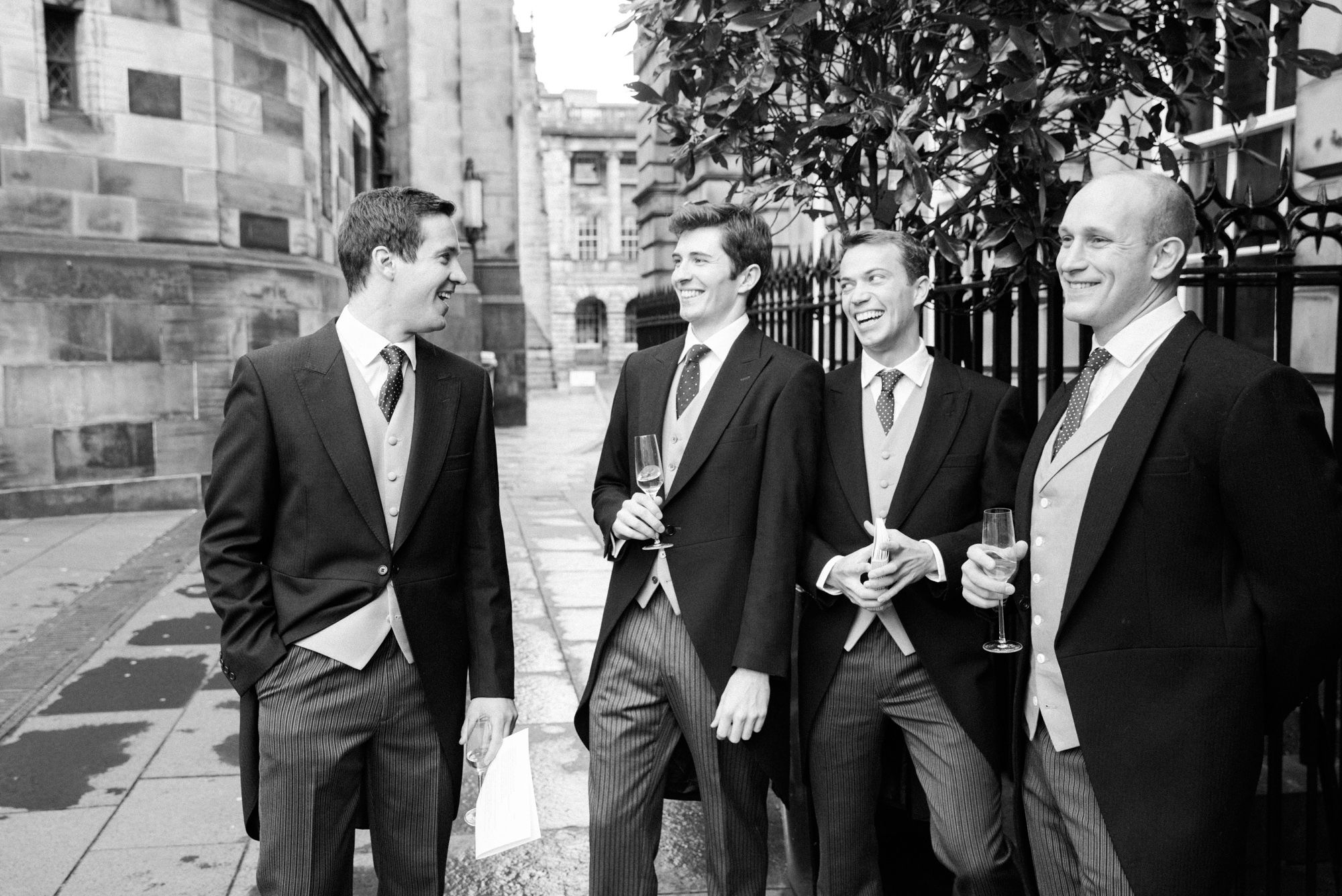 Groom welcoming guests at The Signet Library