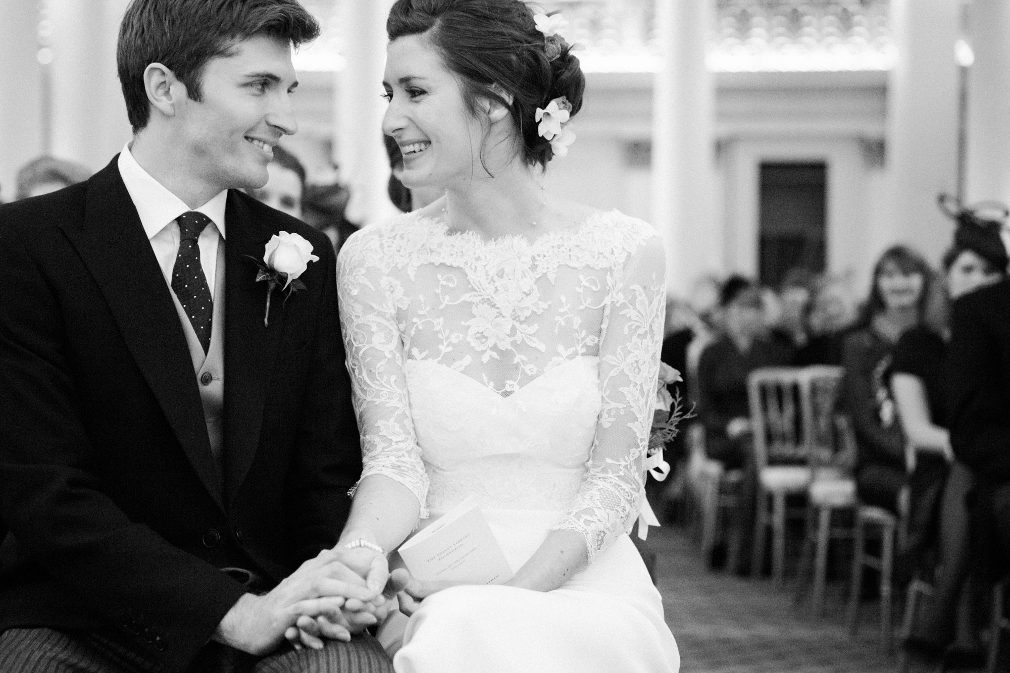 Wedding couple during ceremony at The Signet Library 