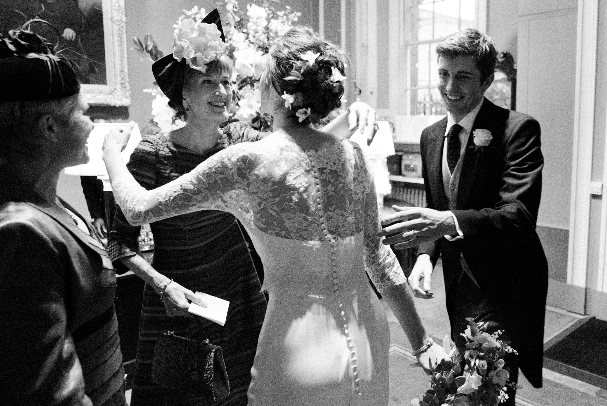 Bride receiving congratulations after wedding ceremony