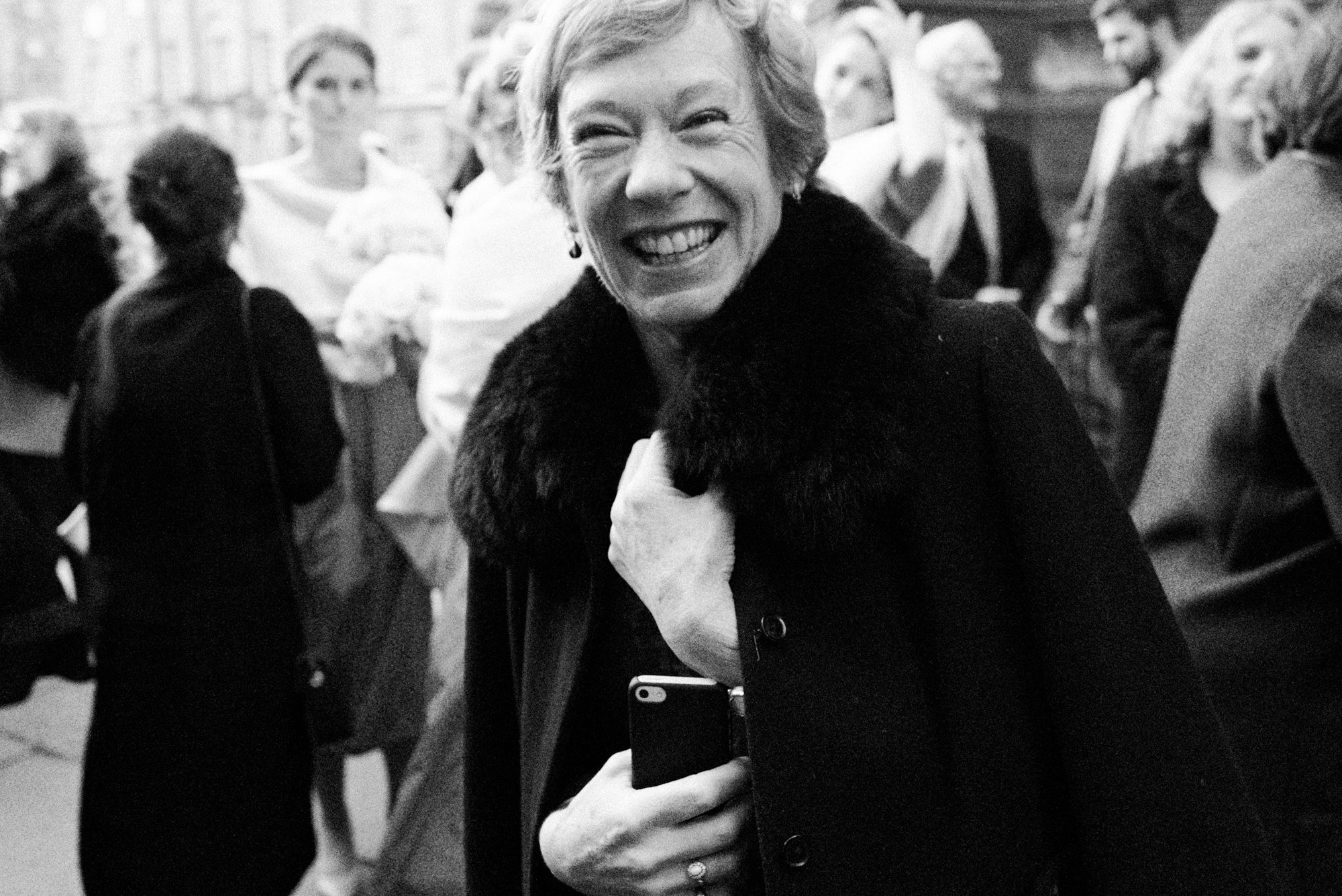 Black and white portrait of a wedding guest 