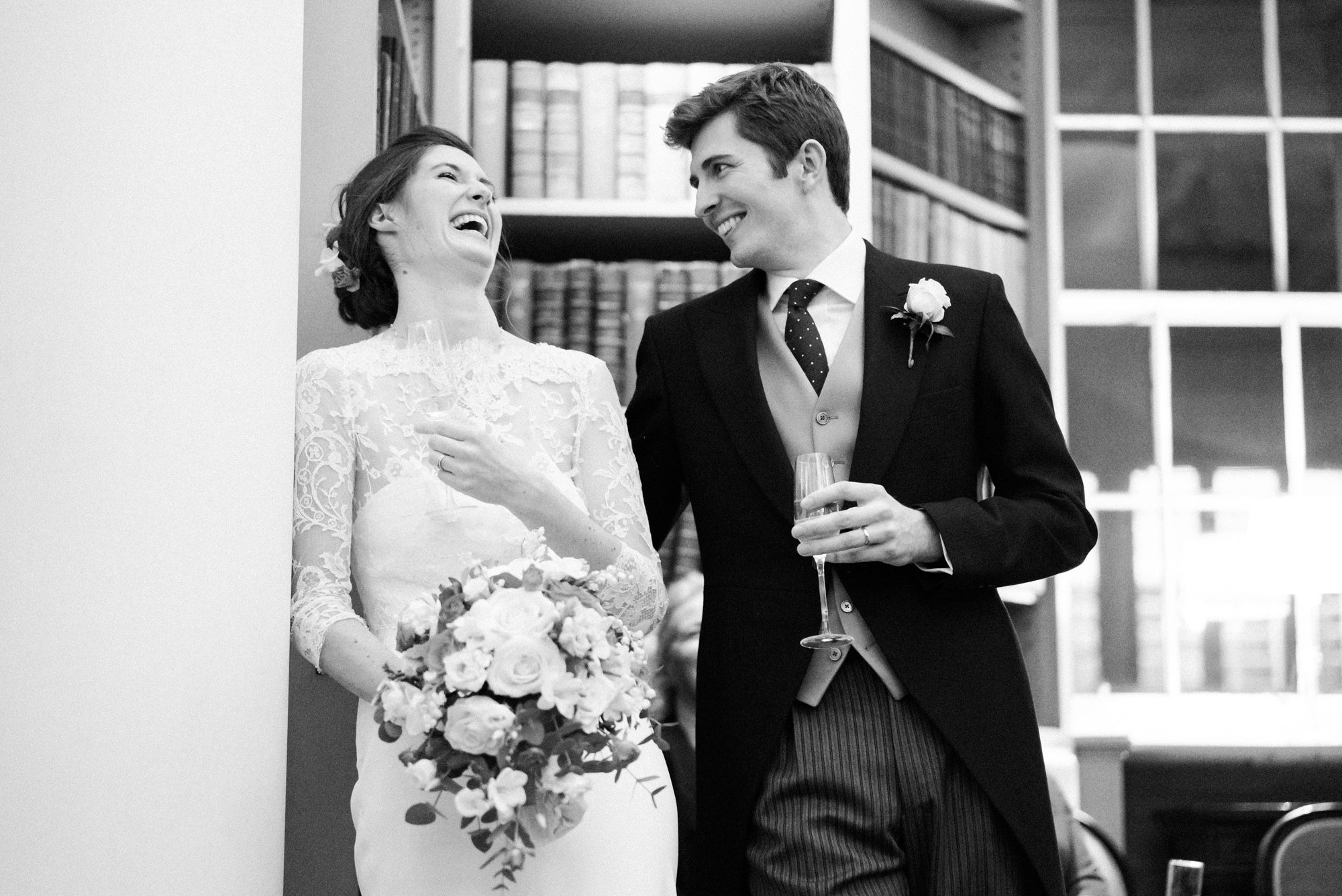 Bride and groom listening to speeches