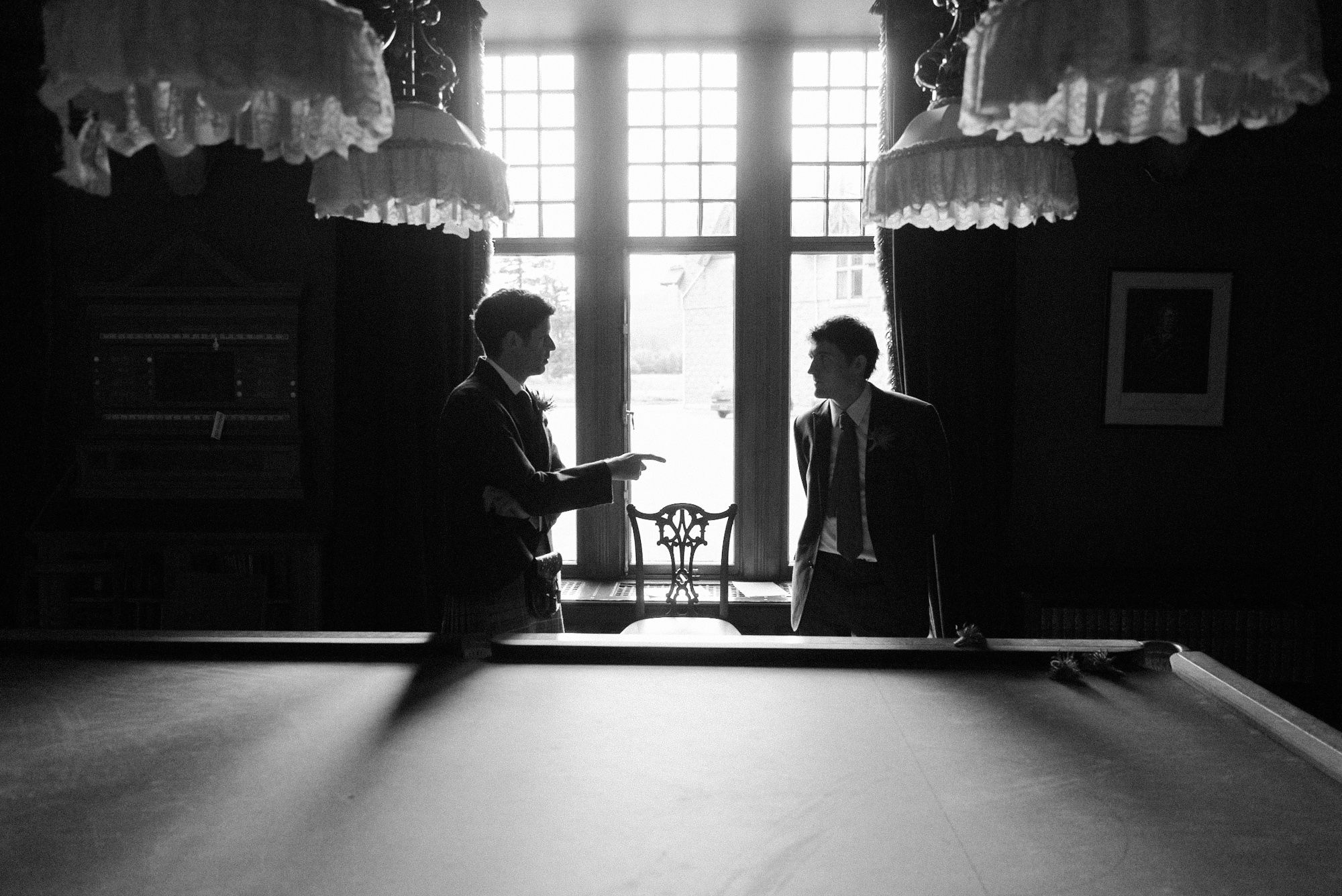 Groom chatting with guest at Mar Lodge Estate