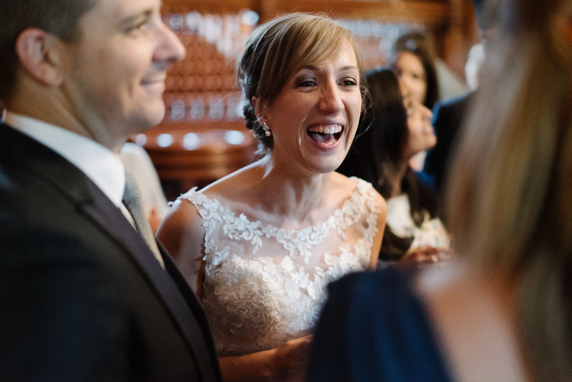 Happy bride celebrating with guests