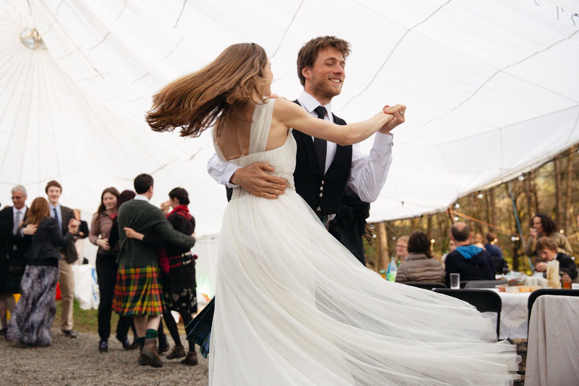 Rustic rural spring wedding couple dancing