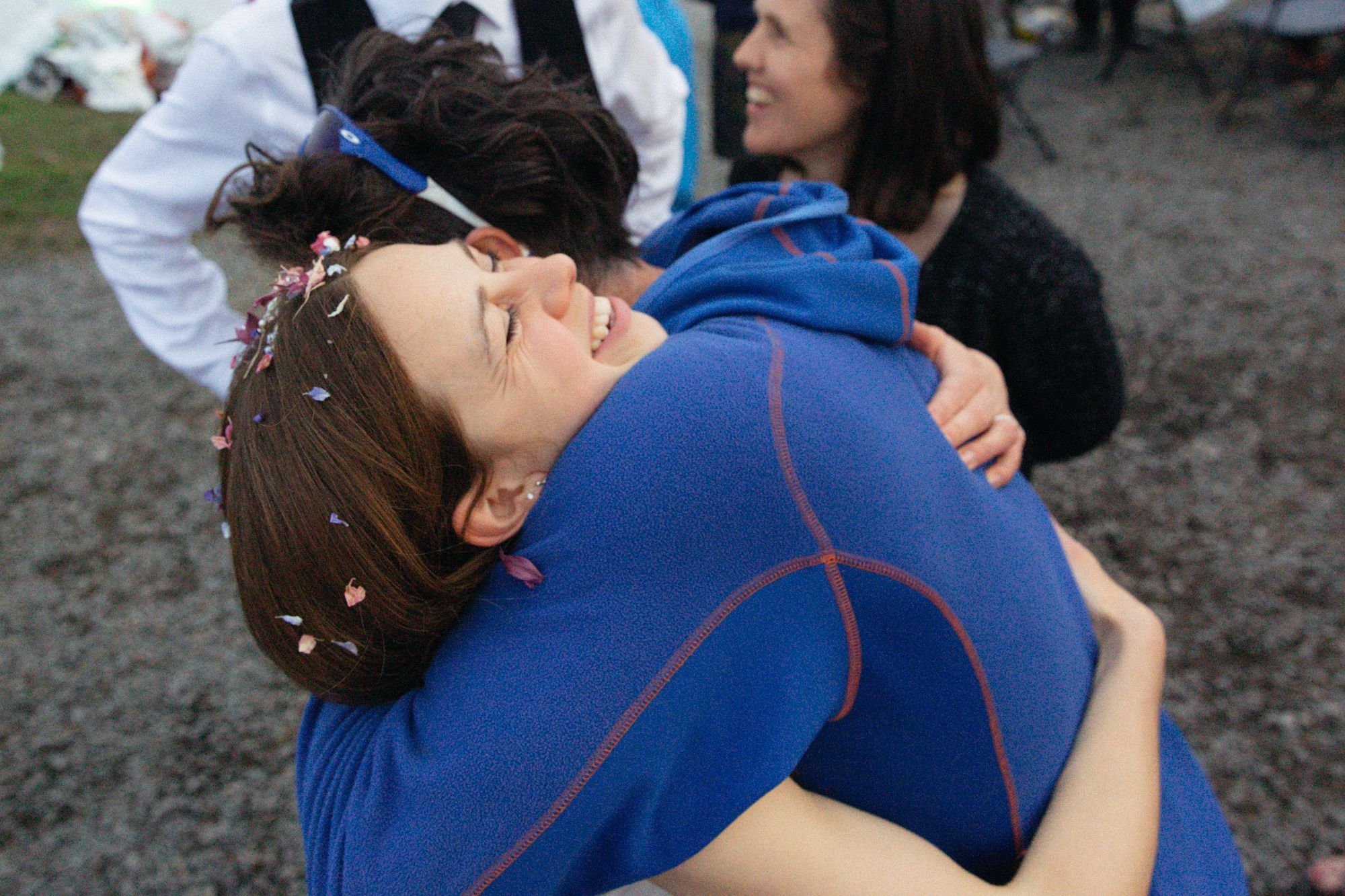 Scottish bride hugging a wedding guest