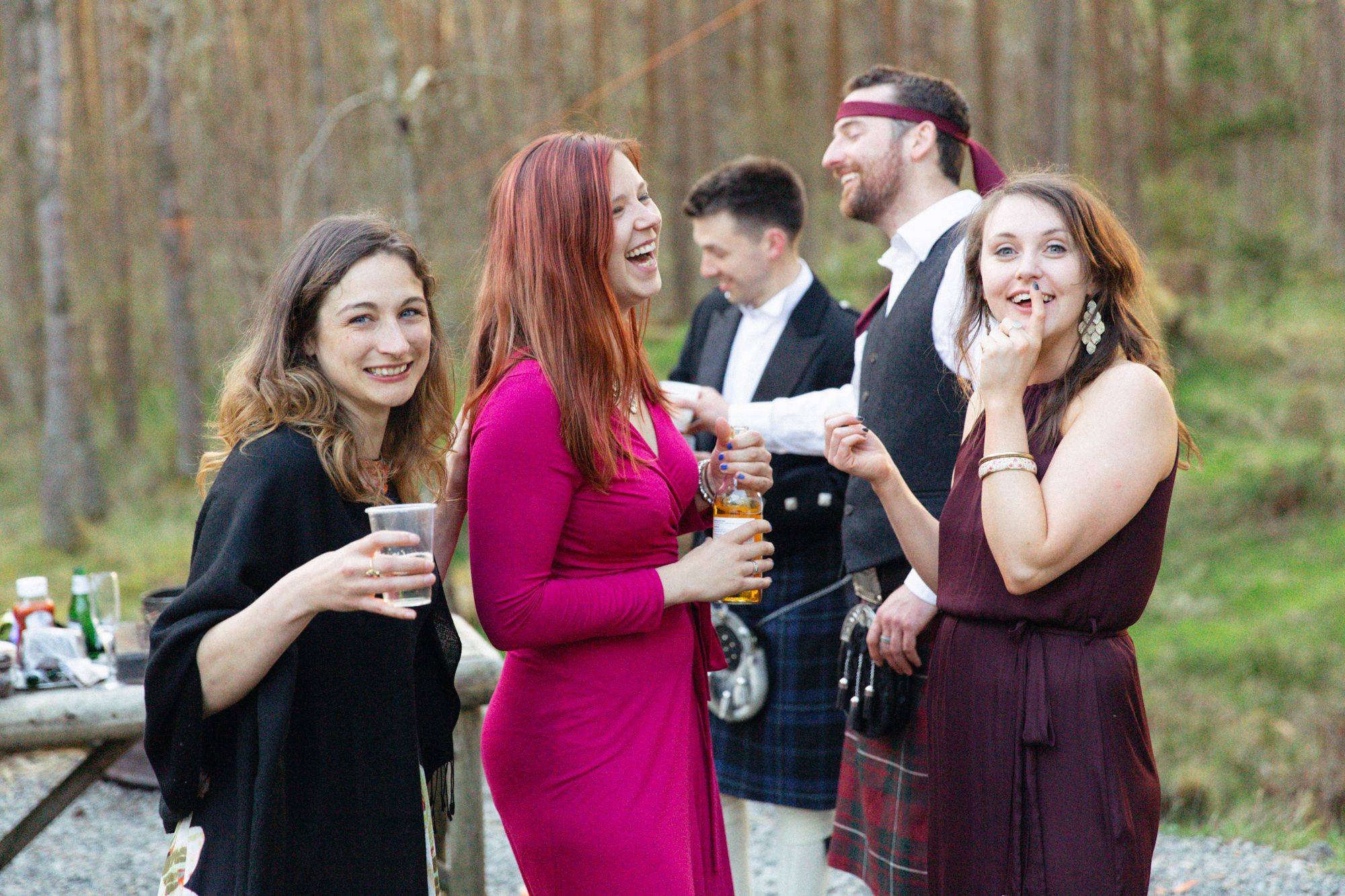 Rustic rural spring wedding guests enjoying themselves