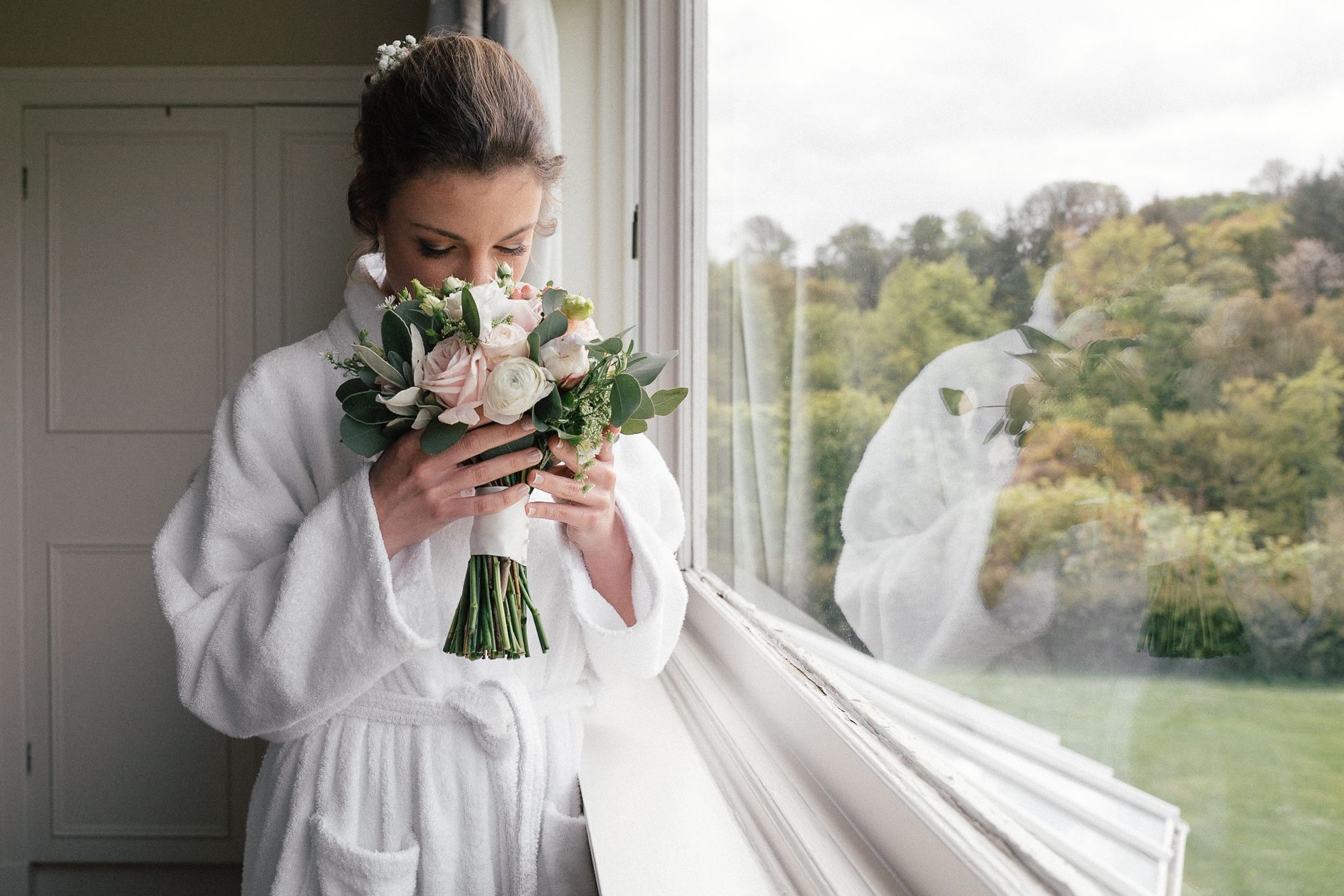 French bride with flowers at Dunglass Estate wedding