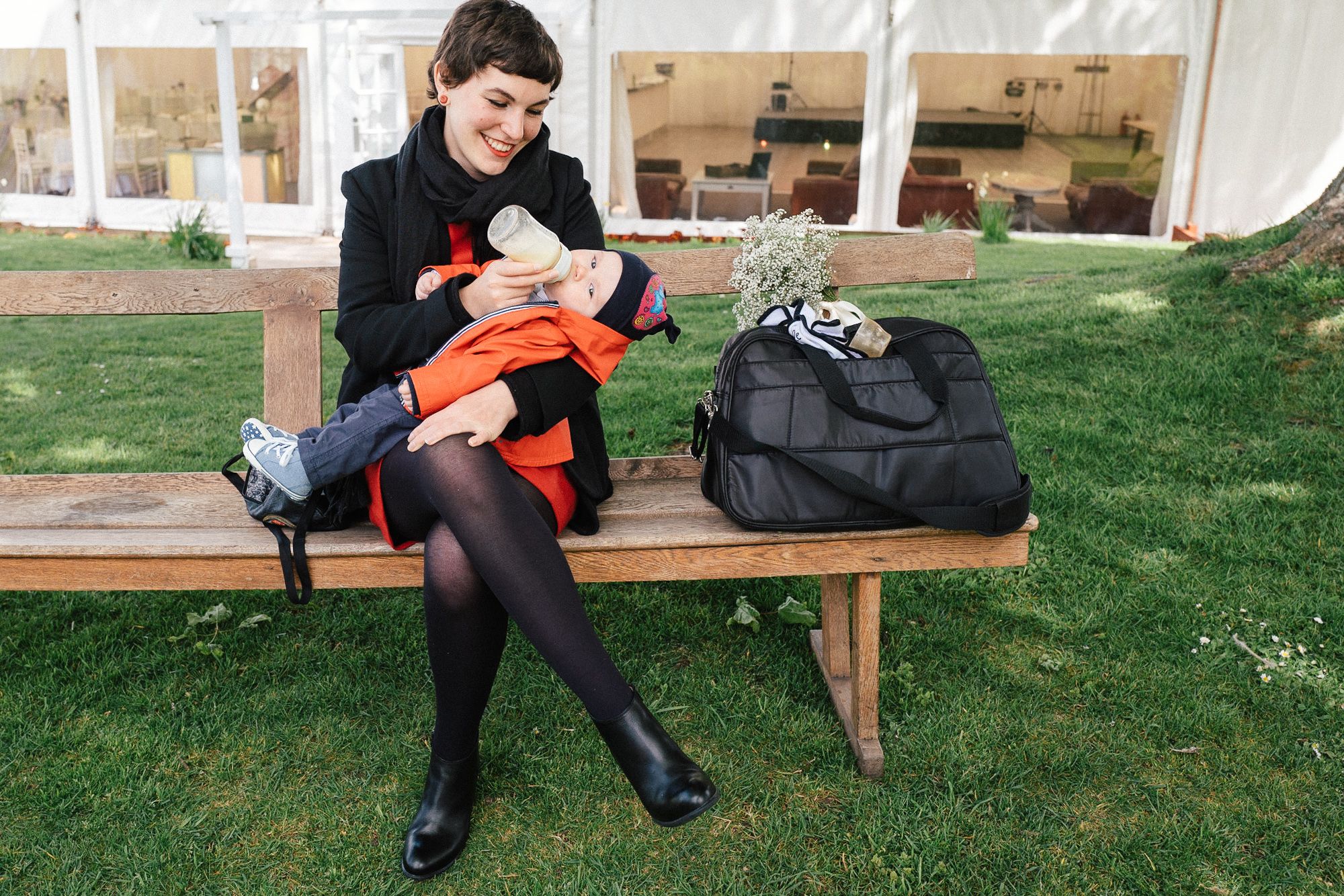 Wedding guest with child