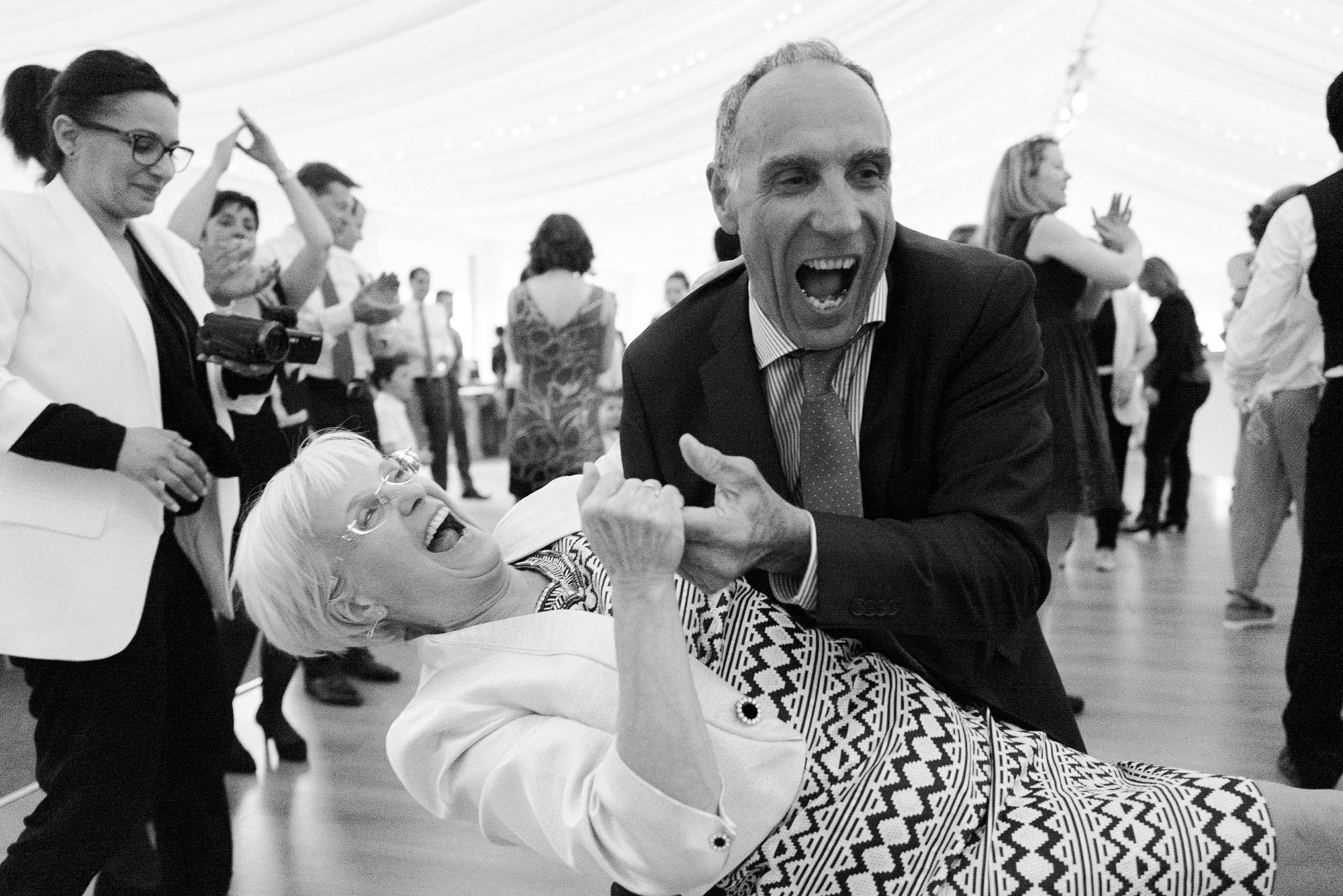 Wedding guests enjoying themselves during dance