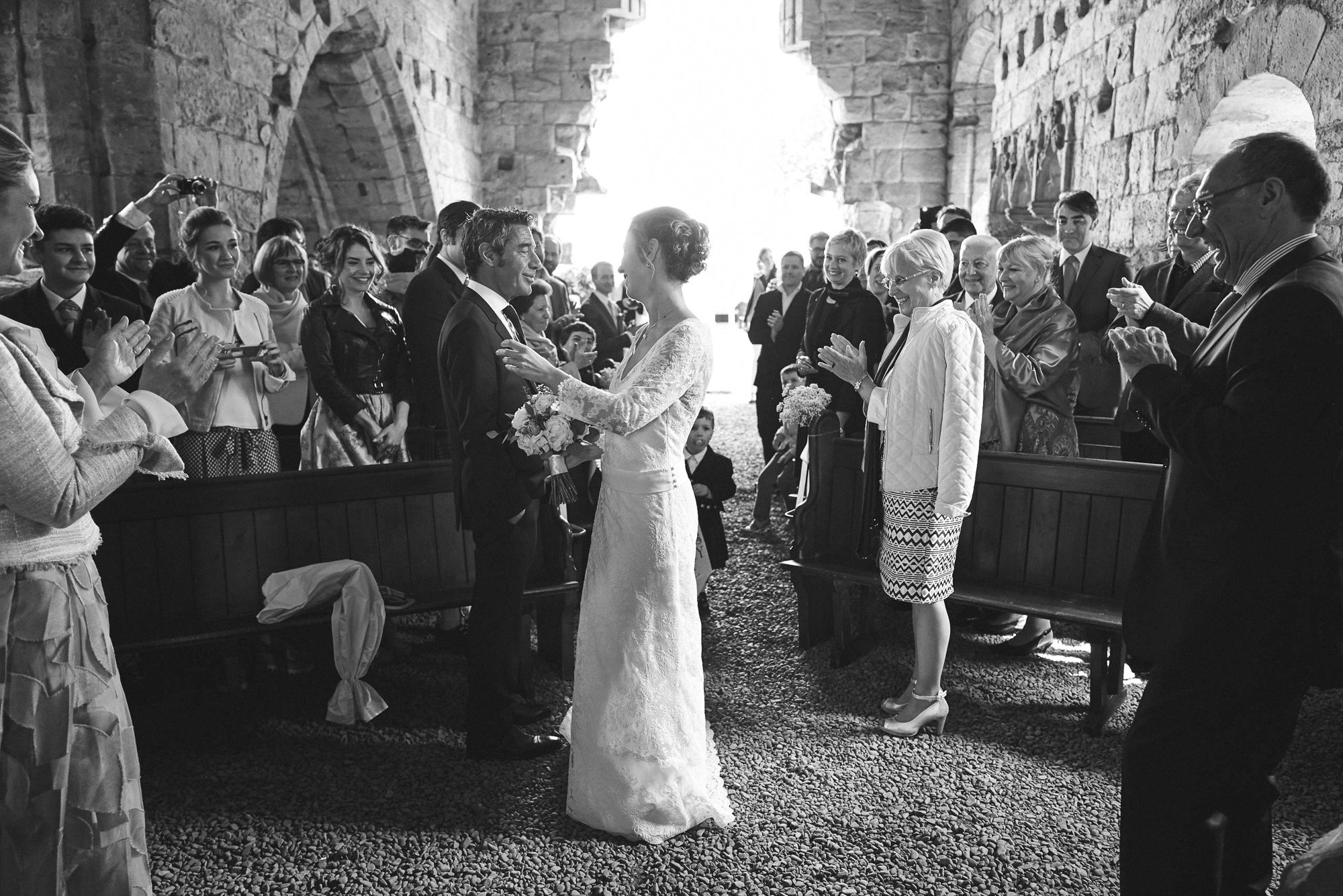 Bride arrives for wedding ceremony greeted by her father